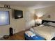 Main bedroom with large TV and a double bed at 2611 Aracatuba Ave, Las Vegas, NV 89121