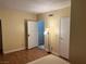 Bedroom with wood floors and access to balcony at 2611 Aracatuba Ave, Las Vegas, NV 89121