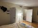 Bright bedroom with wood floors and ample closet space at 2611 Aracatuba Ave, Las Vegas, NV 89121