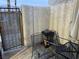 Private patio with seating and a grill at 2611 Aracatuba Ave, Las Vegas, NV 89121