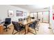 Large conference room featuring a full table, chairs, decor, and an adjacent patio at 3127 S Eastern Ave, Las Vegas, NV 89169