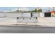 Wide shot of an Absolute Palliative Care building's exterior with ample parking space at 3127 S Eastern Ave, Las Vegas, NV 89169