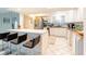 Bright kitchen featuring stainless steel appliances, granite countertops, and bar stool seating at 3127 S Eastern Ave, Las Vegas, NV 89169