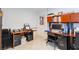 Well lit home office with desks, filing cabinets, and a neutral color palette at 3127 S Eastern Ave, Las Vegas, NV 89169