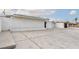 Side view of building, featuring a generous parking area and minimalist exterior design at 3127 S Eastern Ave, Las Vegas, NV 89169