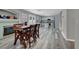 Bright dining area with wooden table and chairs near kitchen and fireplace at 3342 Wardlaw St, Las Vegas, NV 89117