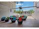 Relaxing patio with colorful wicker furniture and a view of the pool at 353 E Bonneville Ave # 183/283, Las Vegas, NV 89101