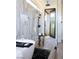Luxurious bathroom with a freestanding tub, marble shower, and access to a private outdoor space at 4377 Cameron Brook Ct, Las Vegas, NV 89129