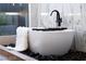 Relaxing bathtub with modern fixtures and marble tile at 4377 Cameron Brook Ct, Las Vegas, NV 89129