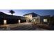 Modern home with sleek architecture and a two-car garage at 4377 Cameron Brook Ct, Las Vegas, NV 89129