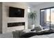 Serene bedroom with fireplace and private access to backyard at 4377 Cameron Brook Ct, Las Vegas, NV 89129