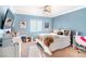 Charming bedroom with a comfortable bed and plenty of space for furniture at 5023 Tunnel Falls Dr, Las Vegas, NV 89141
