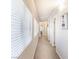 Bright hallway with neutral walls and carpet at 5023 Tunnel Falls Dr, Las Vegas, NV 89141