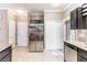 Modern kitchen with stainless steel appliances and ample cabinet space at 5023 Tunnel Falls Dr, Las Vegas, NV 89141