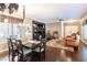 Open concept living and dining area with hardwood floors at 5023 Tunnel Falls Dr, Las Vegas, NV 89141