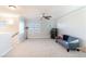 Bright loft with a ceiling fan and game console at 5023 Tunnel Falls Dr, Las Vegas, NV 89141