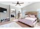 Luxurious main bedroom with an ensuite bathroom and ample space at 5023 Tunnel Falls Dr, Las Vegas, NV 89141