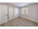 Spacious bedroom with laminate wood floor and sliding door closet at 5264 Child Ct # 87, Las Vegas, NV 89103