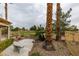 Beautiful backyard with lush landscaping and golf course views, creating a serene retreat at 5416 Lochmor Ave, Las Vegas, NV 89130