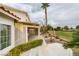Charming backyard with a covered patio, fountain, and golf course views, ideal for relaxation at 5416 Lochmor Ave, Las Vegas, NV 89130