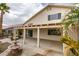 Stunning backyard featuring a covered patio and decorative fountain, perfect for outdoor living at 5416 Lochmor Ave, Las Vegas, NV 89130