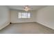 Bedroom featuring neutral carpet, white trim, and ceiling fan at 5416 Lochmor Ave, Las Vegas, NV 89130