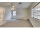 Spacious bedroom featuring neutral carpet, white trim, and ceiling fan at 5416 Lochmor Ave, Las Vegas, NV 89130