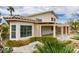 Attractive home exterior featuring a covered patio, mature landscaping, and a welcoming facade at 5416 Lochmor Ave, Las Vegas, NV 89130