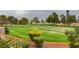 Picturesque golf course view showcasing lush green fairways and mature trees, offering scenic beauty at 5416 Lochmor Ave, Las Vegas, NV 89130