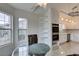Bright kitchen with breakfast nook, tiled floor, double ovens, and ample natural light from the windows at 5416 Lochmor Ave, Las Vegas, NV 89130