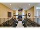 Cozy step-down living room with fireplace and decorative accents at 5416 Lochmor Ave, Las Vegas, NV 89130