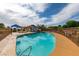 Inviting community pool area featuring a sparkling pool, shaded seating, and well-maintained surroundings at 5416 Lochmor Ave, Las Vegas, NV 89130