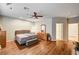 Comfortable bedroom with wood floors, ceiling fan, and large closet at 5615 Criollo Dr, Las Vegas, NV 89122