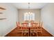 Formal dining room with wood table and chairs, hardwood floors, and chandelier at 5615 Criollo Dr, Las Vegas, NV 89122