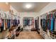 Large walk-in closet featuring plenty of hanging and shelf space for clothing and accessories at 5615 Criollo Dr, Las Vegas, NV 89122