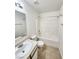 Clean bathroom with a bathtub, sink, and toilet at 6104 Daisy Lee Ave, Las Vegas, NV 89108