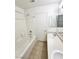 Bathroom with a bathtub and double vanity at 6104 Daisy Lee Ave, Las Vegas, NV 89108