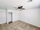 Spacious bedroom with double closets and ceiling fan at 6104 Daisy Lee Ave, Las Vegas, NV 89108