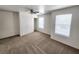 Bedroom with double closet and two windows at 6104 Daisy Lee Ave, Las Vegas, NV 89108