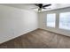 Bright bedroom featuring carpet and ceiling fan at 6104 Daisy Lee Ave, Las Vegas, NV 89108