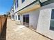 Private backyard with gravel and sliding glass door at 6149 Ethel May Ave, Las Vegas, NV 89108