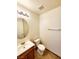 Clean bathroom with a vanity, toilet, and tiled floor at 6149 Ethel May Ave, Las Vegas, NV 89108