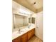 Clean bathroom with double sinks, tub and tile floors at 6149 Ethel May Ave, Las Vegas, NV 89108