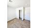 Bedroom with double door closet and tile floor at 6149 Ethel May Ave, Las Vegas, NV 89108