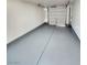 Clean and spacious garage with painted floor at 6149 Ethel May Ave, Las Vegas, NV 89108