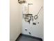 Laundry room with water heater and plumbing at 6149 Ethel May Ave, Las Vegas, NV 89108