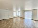 Spacious living area with tile flooring and access to the patio at 6149 Ethel May Ave, Las Vegas, NV 89108