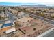 House with backyard, putting green, and pergola, aerial view at 6203 Sun Seed Ct, North Las Vegas, NV 89081