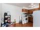 Small kitchen with wood cabinets and appliances at 625 S Royal Crest Cir # 23, Las Vegas, NV 89169
