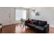 Living room with sofa and wood floors at 625 S Royal Crest Cir # 23, Las Vegas, NV 89169